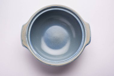 Blue empty ceramic bowl or container with lid, isolated over plain background