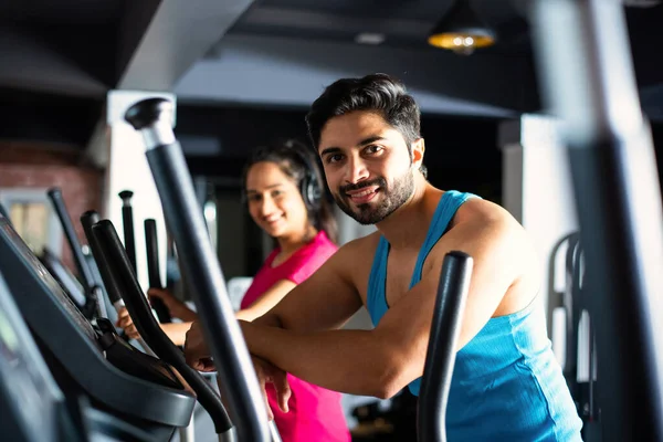 Indian Asian Attractive Couple Doing Cardio Training Program Fitness Center — Stock Photo, Image