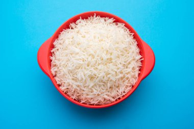 Aromatic Long Basmati cooked plain Rice is an Indian main course food, served in a bowl. selective focus
