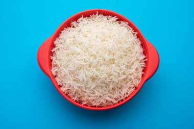 Aromatic Long Basmati cooked plain Rice is an Indian main course food, served in a bowl. selective focus