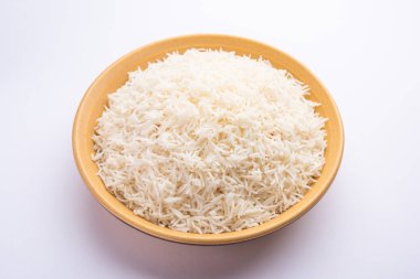 Aromatic Long Basmati cooked plain Rice is an Indian main course food, served in a bowl. selective focus