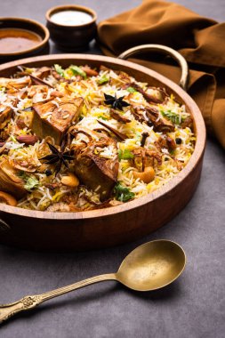 Kathal Biryani is made using raw jackfruit pieces cooked slowly with a variety of spices and mixed with basmati rice. served with curd and salan. Indian vegetarian food