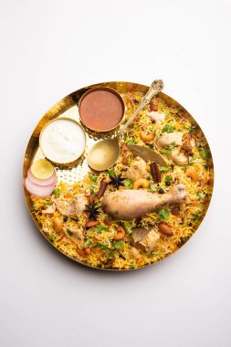 Restaurant style Spicy Chicken Biryani served with Raita and Salan, Popular Indian or Pakistani non vegetarian Food