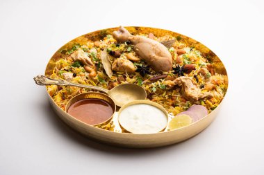 Restaurant style Spicy Chicken Biryani served with Raita and Salan, Popular Indian or Pakistani non vegetarian Food