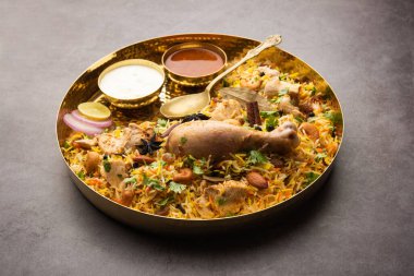 Restaurant style Spicy Chicken Biryani served with Raita and Salan, Popular Indian or Pakistani non vegetarian Food