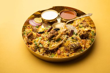 Restaurant style Spicy Chicken Biryani served with Raita and Salan, Popular Indian or Pakistani non vegetarian Food