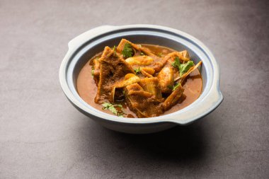 Jackfruit Masala sabji or Fanas Sabzi or Indian style spicy Kathal curry, served in a bowl or karahi. selective focus