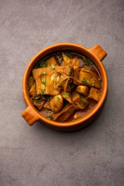 Jackfruit Masala sabji or Fanas Sabzi or Indian style spicy Kathal curry, served in a bowl or karahi. selective focus