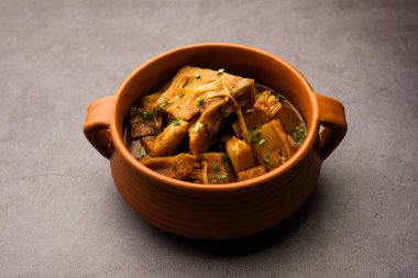 Jackfruit Masala sabji or Fanas Sabzi or Indian style spicy Kathal curry, served in a bowl or karahi. selective focus