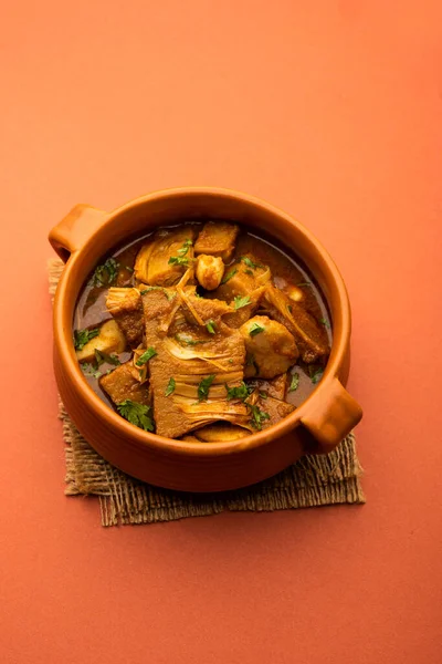 Jackfruit Masala sabji or Fanas Sabzi or Indian style spicy Kathal curry, served in a bowl or karahi. selective focus