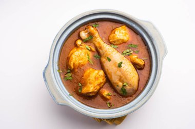 Spicy Reddish Chicken Curry or red Murgh Masala or korma. Indian non-vegetarian food. selective focus.