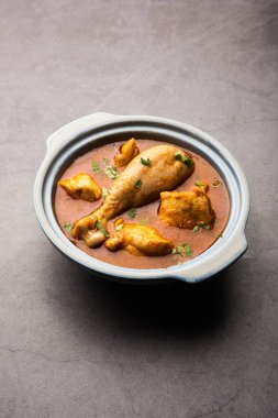 Spicy Reddish Chicken Curry or red Murgh Masala or korma. Indian non-vegetarian food. selective focus.