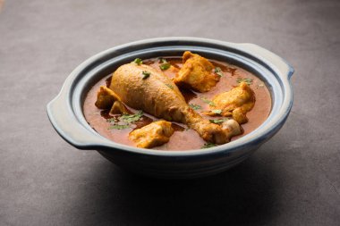 Spicy Reddish Chicken Curry or red Murgh Masala or korma. Indian non-vegetarian food. selective focus.