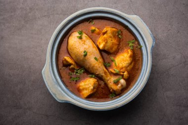 Spicy Reddish Chicken Curry or red Murgh Masala or korma. Indian non-vegetarian food. selective focus.