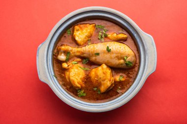 Spicy Reddish Chicken Curry or red Murgh Masala or korma. Indian non-vegetarian food. selective focus.