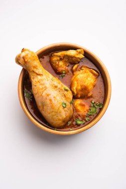 Spicy Reddish Chicken Curry or red Murgh Masala or korma. Indian non-vegetarian food. selective focus.