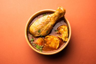 Spicy Reddish Chicken Curry or red Murgh Masala or korma. Indian non-vegetarian food. selective focus.