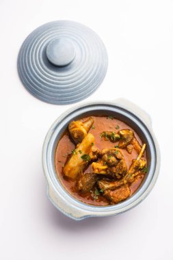 Indian style meat dish or Mutton OR Gosht Masala OR lamb rogan josh served in a bowl, selective focus