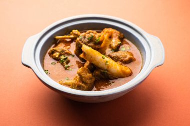 Indian style meat dish or Mutton OR Gosht Masala OR lamb rogan josh served in a bowl, selective focus