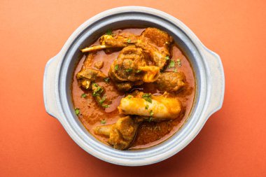 Indian style meat dish or Mutton OR Gosht Masala OR lamb rogan josh served in a bowl, selective focus
