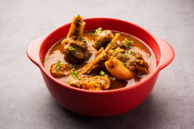 Indian style meat dish or Mutton OR Gosht Masala OR lamb rogan josh served in a bowl, selective focus