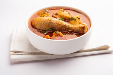 Spicy Reddish Chicken Curry or red Murgh Masala or korma. Indian non-vegetarian food. selective focus.