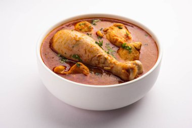 Spicy Reddish Chicken Curry or red Murgh Masala or korma. Indian non-vegetarian food. selective focus.