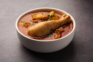 Spicy Reddish Chicken Curry or red Murgh Masala or korma. Indian non-vegetarian food. selective focus.