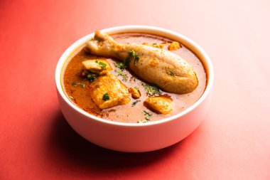 Spicy Reddish Chicken Curry or red Murgh Masala or korma. Indian non-vegetarian food. selective focus.