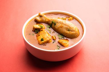 Spicy Reddish Chicken Curry or red Murgh Masala or korma. Indian non-vegetarian food. selective focus.