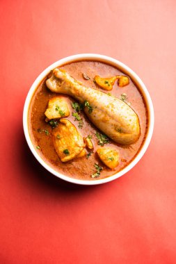 Spicy Reddish Chicken Curry or red Murgh Masala or korma. Indian non-vegetarian food. selective focus.