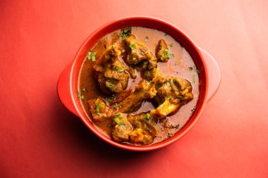 Indian style meat dish or Mutton OR Gosht Masala OR lamb rogan josh served in a bowl, selective focus