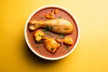 Spicy Reddish Chicken Curry or red Murgh Masala or korma. Indian non-vegetarian food. selective focus.