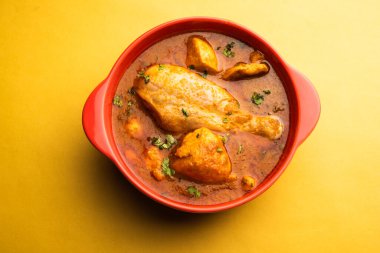 Spicy Reddish Chicken Curry or red Murgh Masala or korma. Indian non-vegetarian food. selective focus.