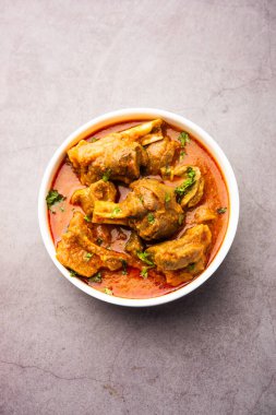Indian style meat dish or Mutton OR Gosht Masala OR lamb rogan josh served in a bowl, selective focus