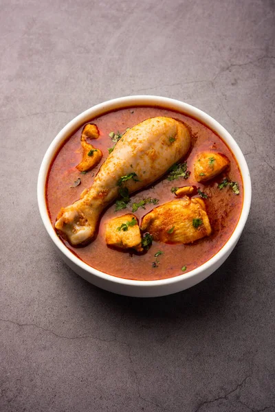 Spicy Reddish Chicken Curry or red Murgh Masala or korma. Indian non-vegetarian food. selective focus.