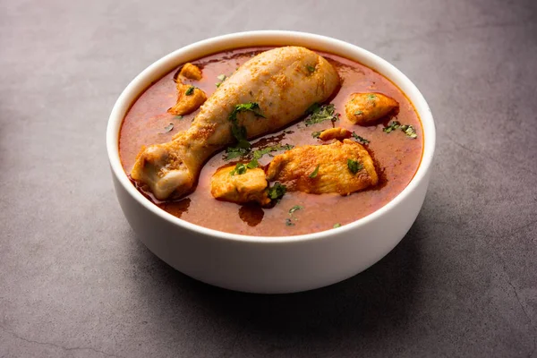 Spicy Reddish Chicken Curry or red Murgh Masala or korma. Indian non-vegetarian food. selective focus.