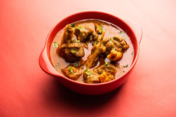 Indian style meat dish or Mutton OR Gosht Masala OR lamb rogan josh served in a bowl, selective focus