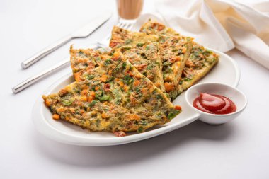 Ekmek omleti Hindistan 'dan hızlı ve kolay bir kahvaltıdır. Yumurta hamuruna baharat ve sığ yağda kızartılmış taze ekmek dilimleri. Domates, ketçap ve çayla servis edilir.