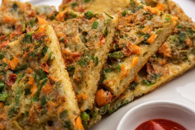 Ekmek omleti Hindistan 'dan hızlı ve kolay bir kahvaltıdır. Yumurta hamuruna baharat ve sığ yağda kızartılmış taze ekmek dilimleri. Domates, ketçap ve çayla servis edilir.