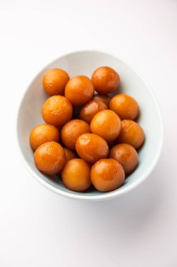 Gulab Jamun Hindistan 'da popüler süt bazlı tatlı hamur tatlısı Diwali, bayram, hatta düğün partileri gibi festivallerde Pakistanlı.