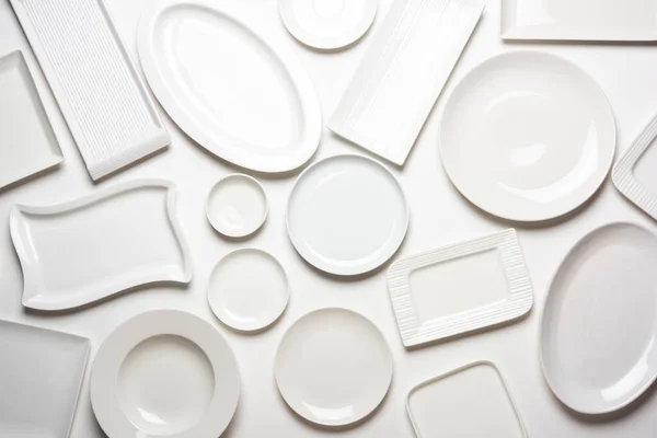 Empty White Ceramic Plates Group White Background Top View — Stock Photo, Image
