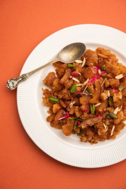 Basit ve lezzetli ekmek halkası ya da halva ya da shira ya da sheera, Hint tatlısı.