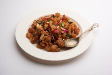 Basit ve lezzetli ekmek halkası ya da halva ya da shira ya da sheera, Hint tatlısı.