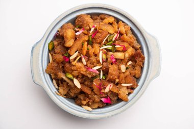 Basit ve lezzetli ekmek halkası ya da halva ya da shira ya da sheera, Hint tatlısı.