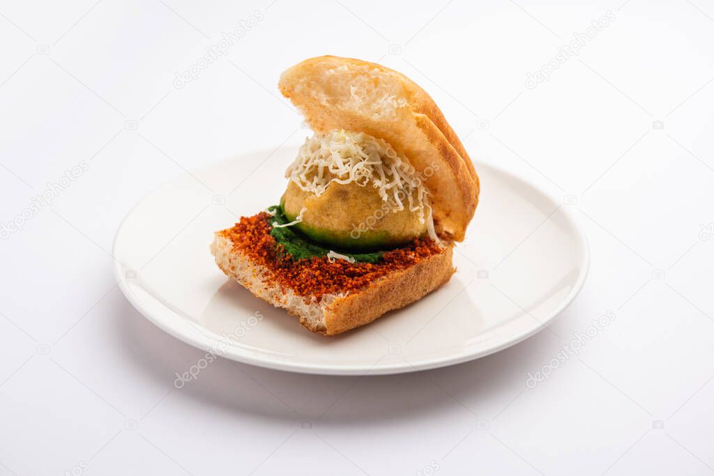 Cheese Vada pav or Grated cheese Wada Pao, popular Bombay snack food