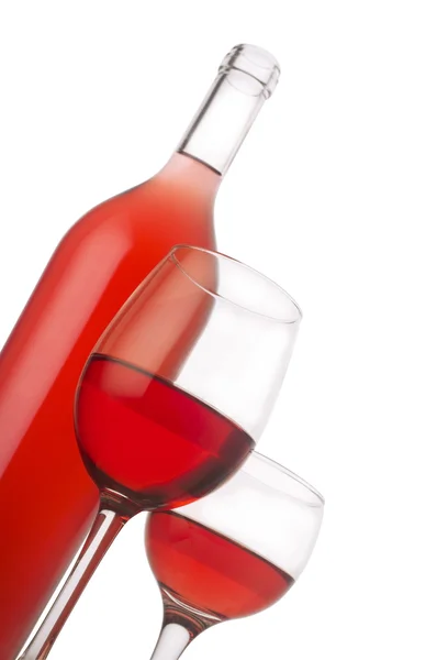Garrafa de vinho rosa com óculos — Fotografia de Stock