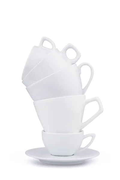 Pile verticale de nombreuses tasses de porcelaine de café blanc isolé — Photo