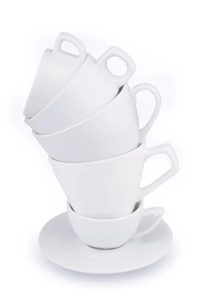 Birçok beyaz kahve porselen fincan izole dikey yığın — Stok fotoğraf