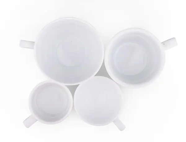Багато білих чашок порцеляни кави ізольовані — стокове фото